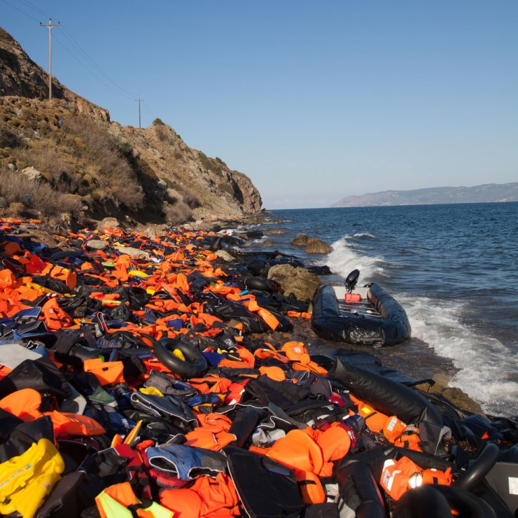 Refugee boat with vests on Lesbos